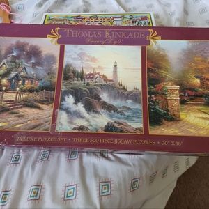 Three 500 piece puzzle set